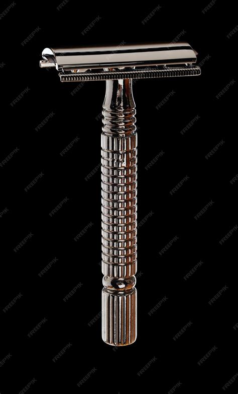 Premium Photo | Vintage barber shop razor tool on black