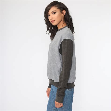 Brandy Melville Women's Grey and Black Sweatshirt | Depop