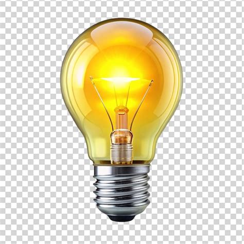 A light bulb with a silver base and a yellow filament inside on ...