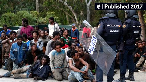 Risking Injury and Arrest, African Migrants Storm a Gate to Europe ...