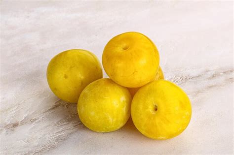 Yellow sweet plum heap fruit | Premium Photo