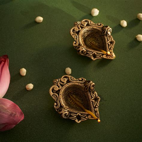 Designer Peacock Swastik Diya Pack of 2 – DecorTwist