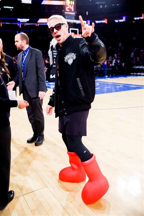 Why Is Everyone Wearing These Cartoonish Red Boots? - CelebsNow