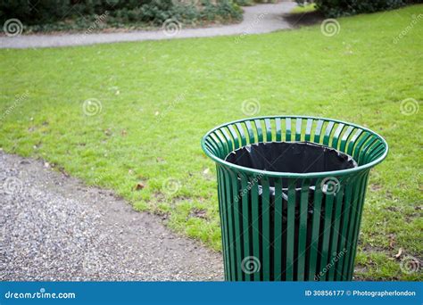 Trash can in a park stock image. Image of management - 30856177