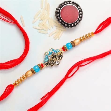 Send Beautiful Peacock Rakhi to New Zealand Online | Rakhibazaar.com