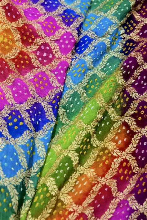MULTICOLOR BANDHANI SAREE IN PURE KHADDI GEORGETTE WITH GOLDEN ZARI BO