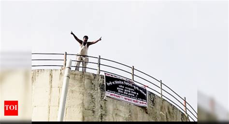 Villager threatens to jump off water tank at Rajgurunagar to protest ...