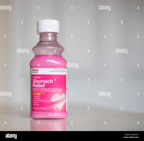 Pink stomach relief liquid used to cure an upset stomach, nausea, heart burn, Diarrhea etc Stock ...