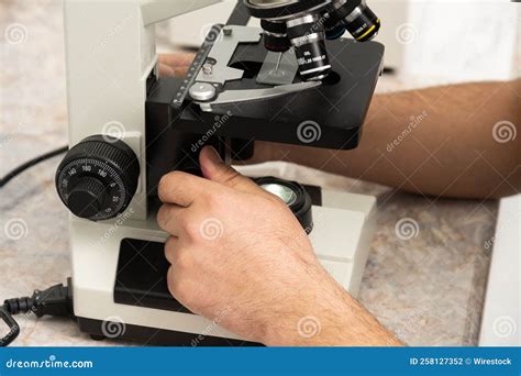 Image result for A Person Inspecting Using Microscope