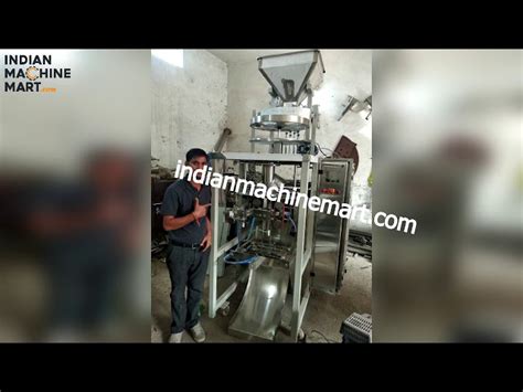 Filling Machine - Rotary Vacuum Based Powder Filling Machines from New ...