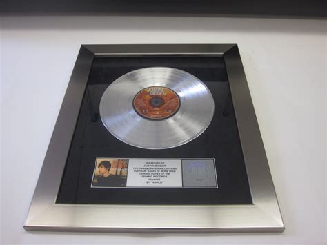 Charitybuzz: Platinum RIAA Certified Award Presented to Justin Bieber