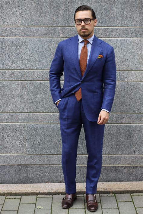 Orange tie x Blue suit | Suits and sneakers, Blue suit brown shoes ...