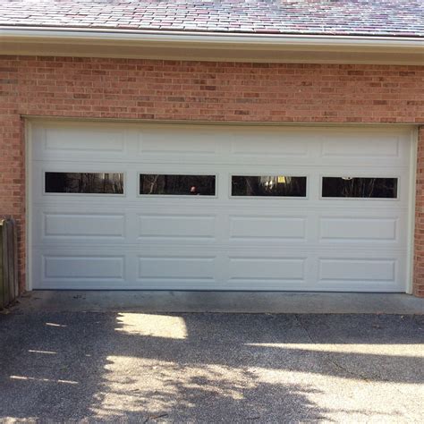 16x7 Model 4251 Almond Garage Door with Plain Glass