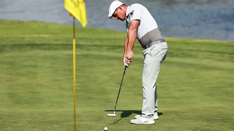 Is it a penalty to accidentially hit the flagstick while putting? Rules Guy