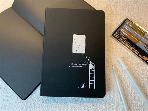 The Beautiful. Black paper notebook
