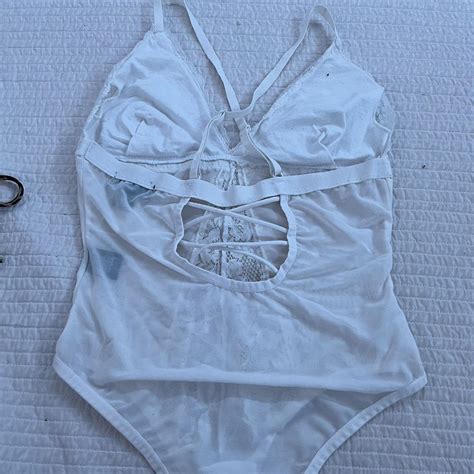 Sexy White Crossover Lacy Body Suit Size M but fits... - Depop