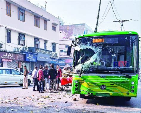 Two injured after DTC e-bus jumps divider