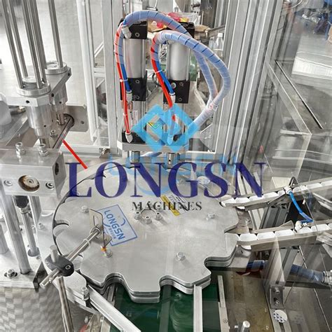 Image result for Automatic Cap Lining. Machine