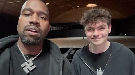 Kanye poses in a swastika chain with white supremacist Nick Fuentes ...