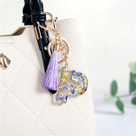 Petals And Glitter P Dual Hook Keychain Online - Premium Keychain ...