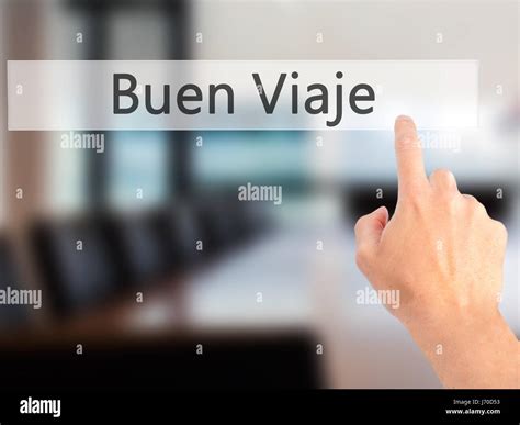 Buen Viaje (Good Trip in Spanish) - Hand pressing a button on blurred ...
