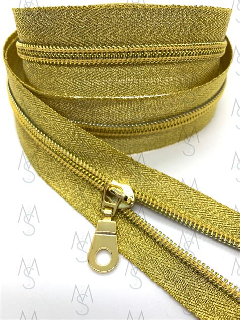 Gold Nylon Coil Zipper with Metallic Tape & Gold Pulls - Zipper by the ...