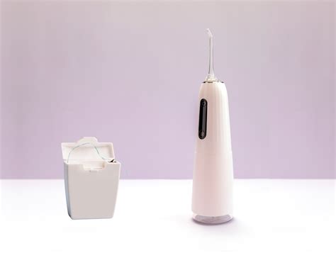 Water Flossing vs. String Flossing | Hamilton Dental