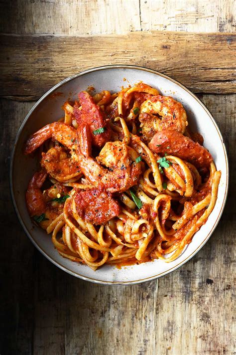Spicy Cajun Shrimp Pasta with Sausage - Serving Dumplings