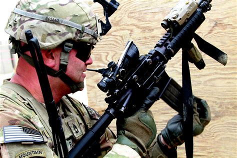 Shoot, Move and Communicate: Wolverines conduct advanced rifle ...