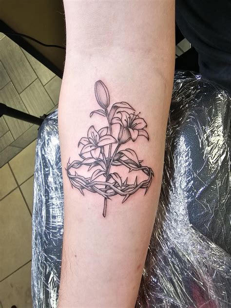 Thorn crown w/ lilies, done by me at Fleshstains Tattoo : r/tattoo