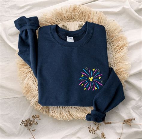 Embroidered Disney Fireworks Unisex Crewneck Sweater | Disney World ...