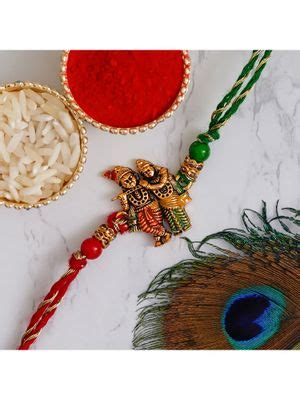 Buy eCraftIndia Multicolour Radha Krishna Playing Flute Religious Rakhi ...