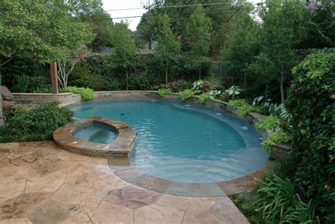 small pool with waterfall designs | Free Form Pool With Lush Design ...
