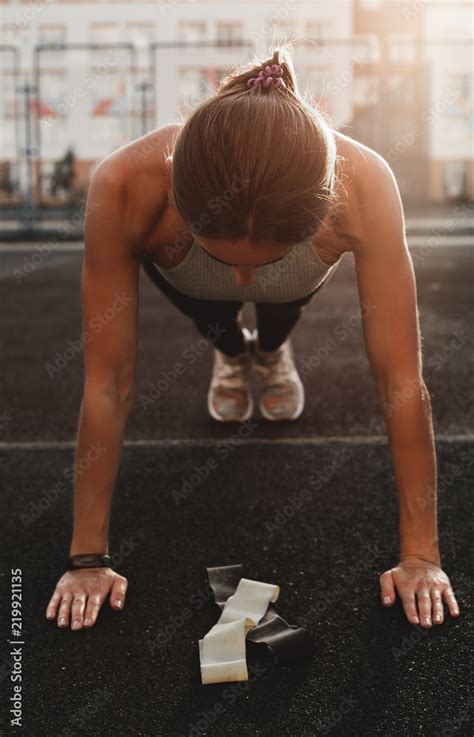 sports girl push-up Stock Photo | Adobe Stock