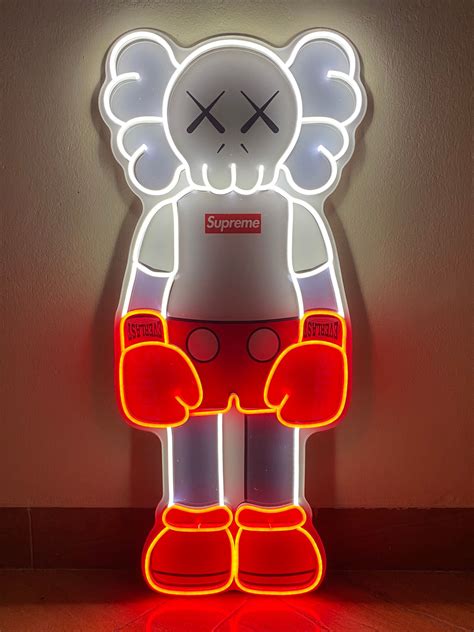 orange kaws wallpaper