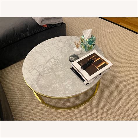 CB2 Round Marble Top Coffee Table - AptDeco