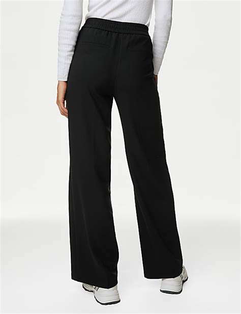 Buy Woven Elasticated Waist Wide Leg Trousers at Marks & Spencer