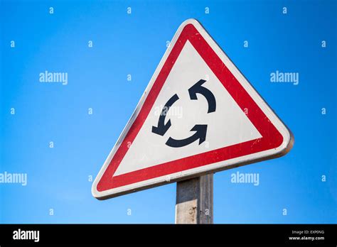 Image result for Red Triangle Roundabout Sign