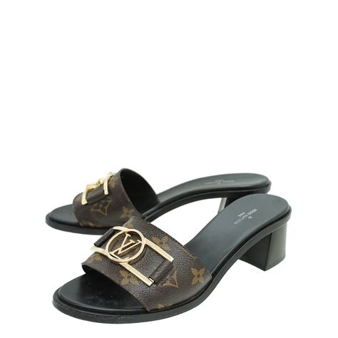 Louis Vuitton Monogram Lock It Mules 37.5 – THE CLOSET