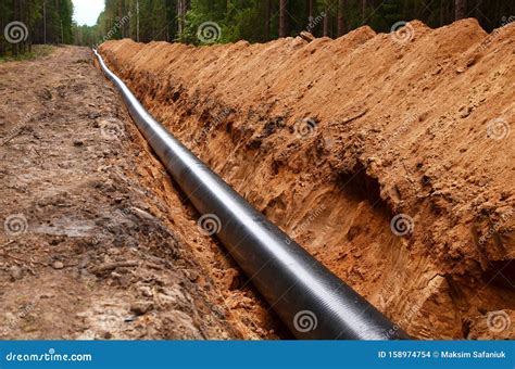 Natural Gas Pipeline Construction Work. a Dug Trench in the Ground for ...