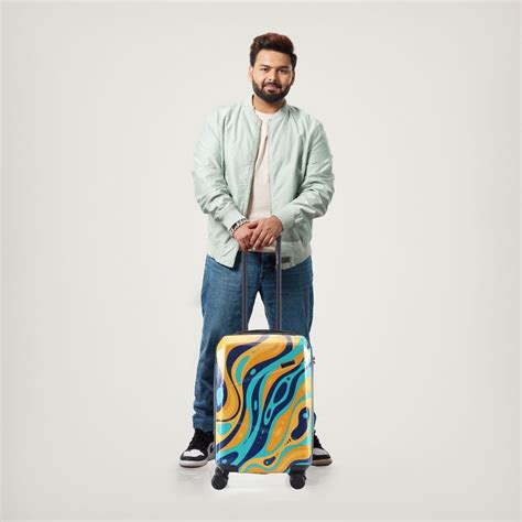 Buy Nasher Miles Manali Polycarbonate Orange Multicolor Trolley Bag Online