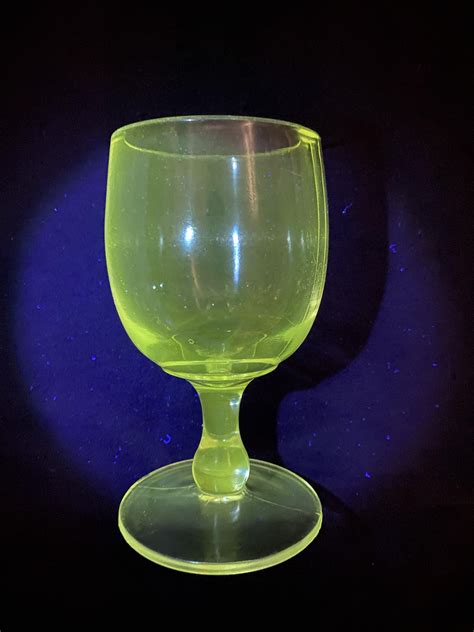 Can anyone help me identify this heavy uranium glass goblet? Any info appreciated, thanks all ...