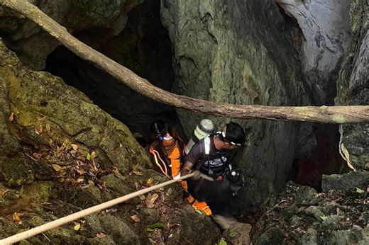 Heavy rains threaten to delay search for 2 people still missing in Laos cave