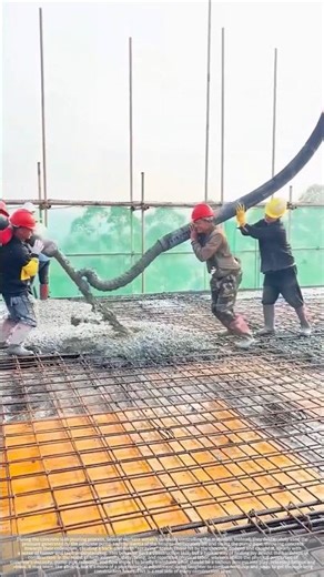 Concrete being tossed around – finding joy amidst hardship on the construction site.