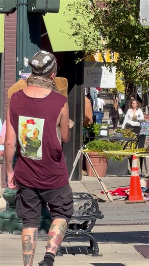 Commie Snake Man Hits the Streets of Downtown Asheville