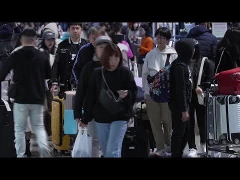 Taiwan travelers keep plans despite Chinese military drills | REUTERS