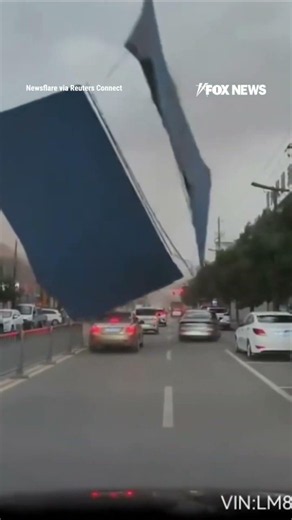 Powerful winds RIP steel roof onto vehicles in China #foxnews #news #shorts #china #weather