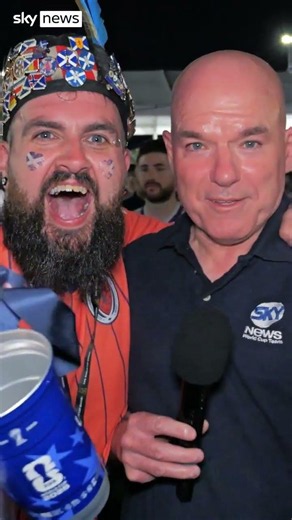 Watch as Scotland fans mob Sky News correspondent after win