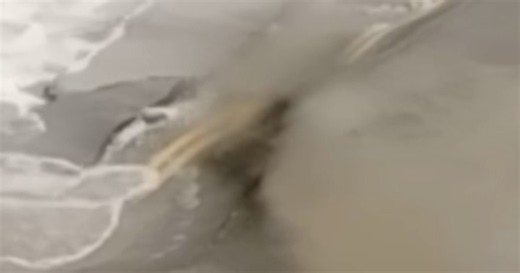 Traffic cam shows road erosion along Outer Banks