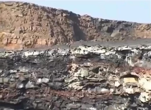 Volcano erupts after a man throws a rock into it.